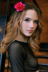 Sofi Roko Offers A Tempting Rear View Of Her Sexy Booty