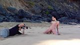 Hot cutie reveals her beautiful body to the world. Fresh breeze from the sea makes her nipples really hard and ready for the shooting.