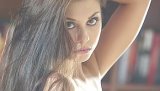 Striking babe disrobes her beautiful inner clothes exposing her erect nipples and moist cock deprived pussy with flowery lips & smooth clitoris.