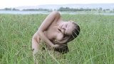 Fall in love with skinny brunette practicing unforgettable solo session among the trees. She is touching her small tits and trimmed pussy gently.