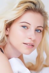 Lilly Bella Caressing Her Lovely Breasts And Tugging Her Panties Aside